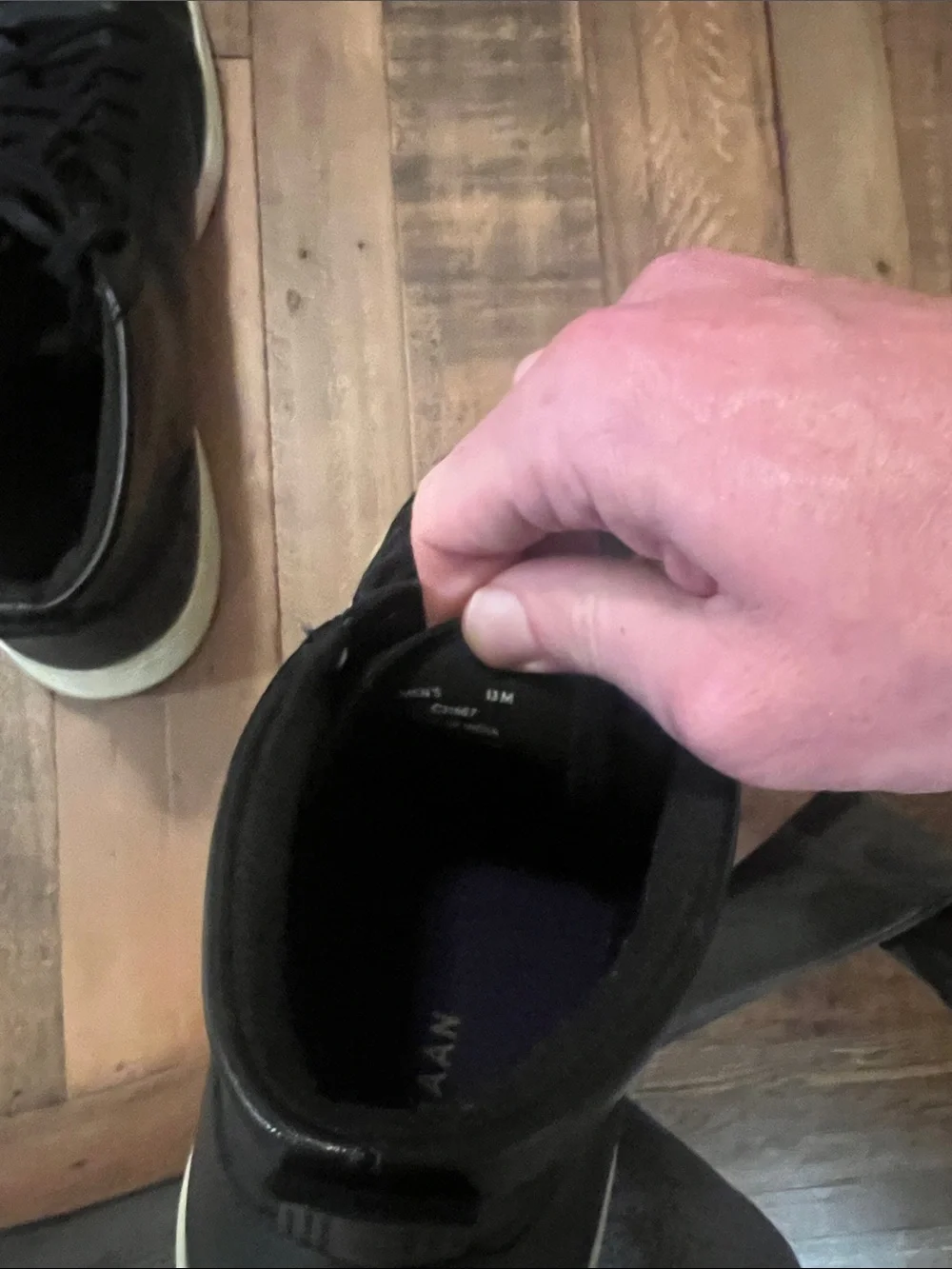 Cole Haan Black Leather High-Top Sneakers with Cream Sole